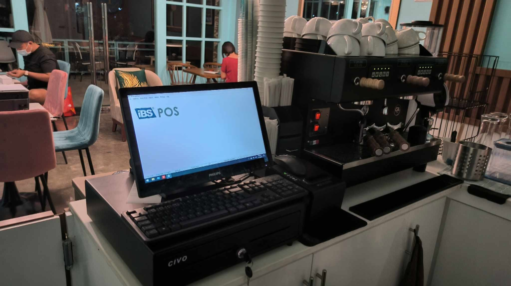 Compact front-counter POS setup for coffee bar